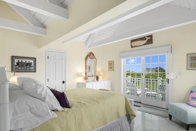 a bed room with a bed and a couch