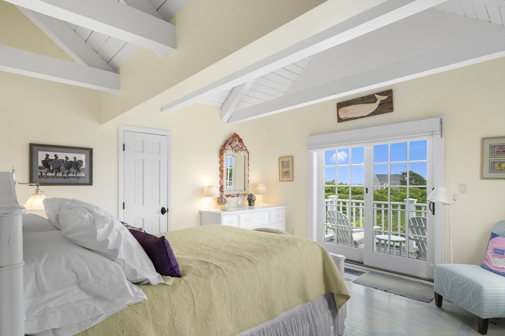 28 Bosworth Road Nantucket, MA 02554 - Photo 23 of 34 a bed room with a bed and a couch