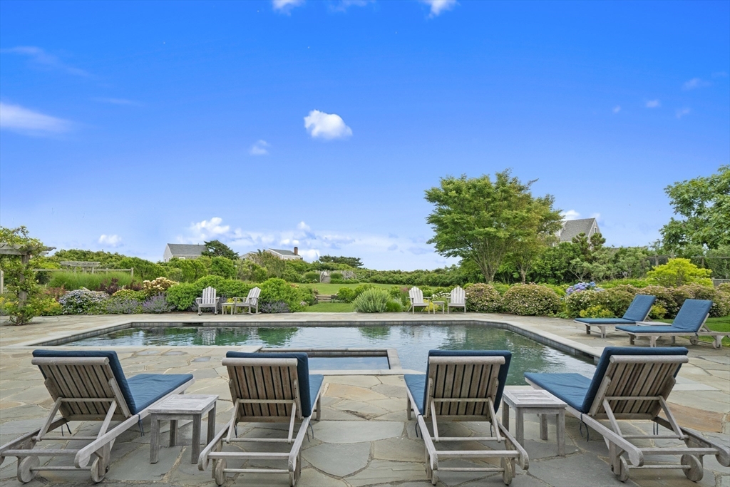 28 Bosworth Road Nantucket, MA 02554 - Photo 30 of 34 a view of a chairs and table in patio