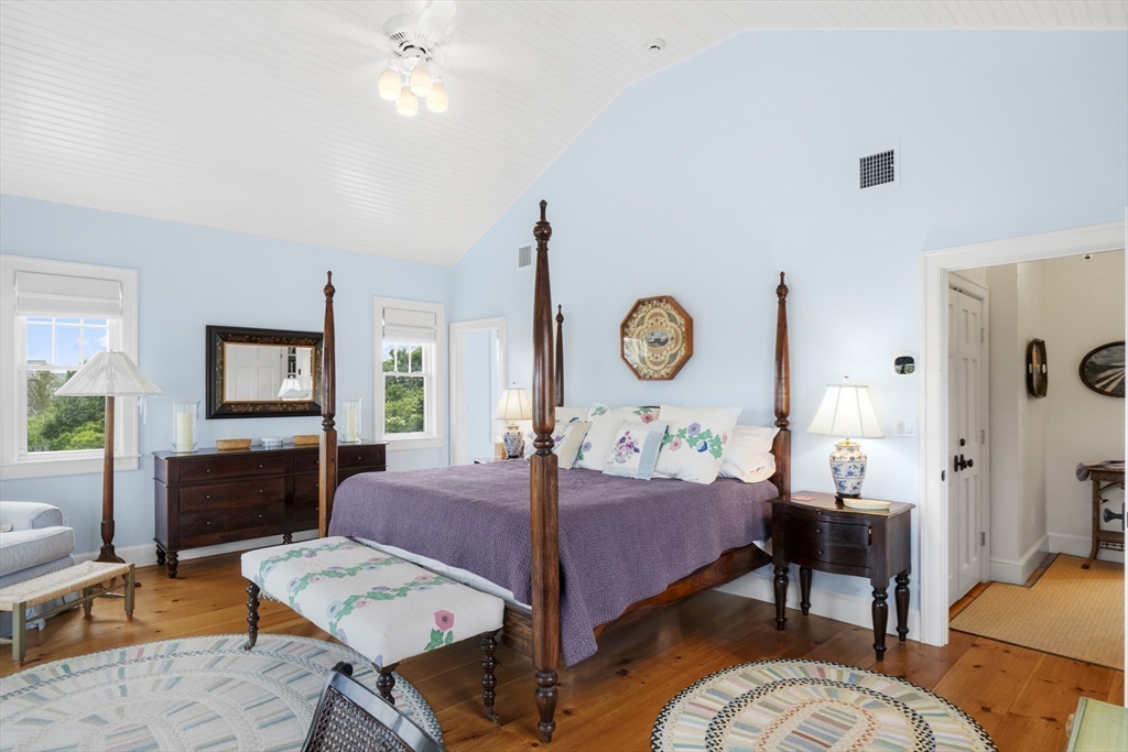 28 Bosworth Road Nantucket, MA 02554 - Photo 9 of 34 a living room with furniture a rug and a window