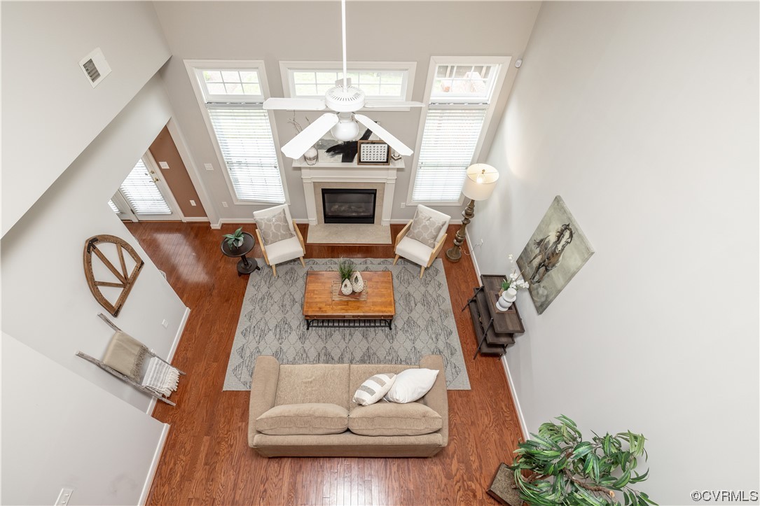 2152 Magnolia Grove Way, Unit 2152 Midlothian, VA 23113 - Photo 16 of 38 a living room with furniture and a fireplace