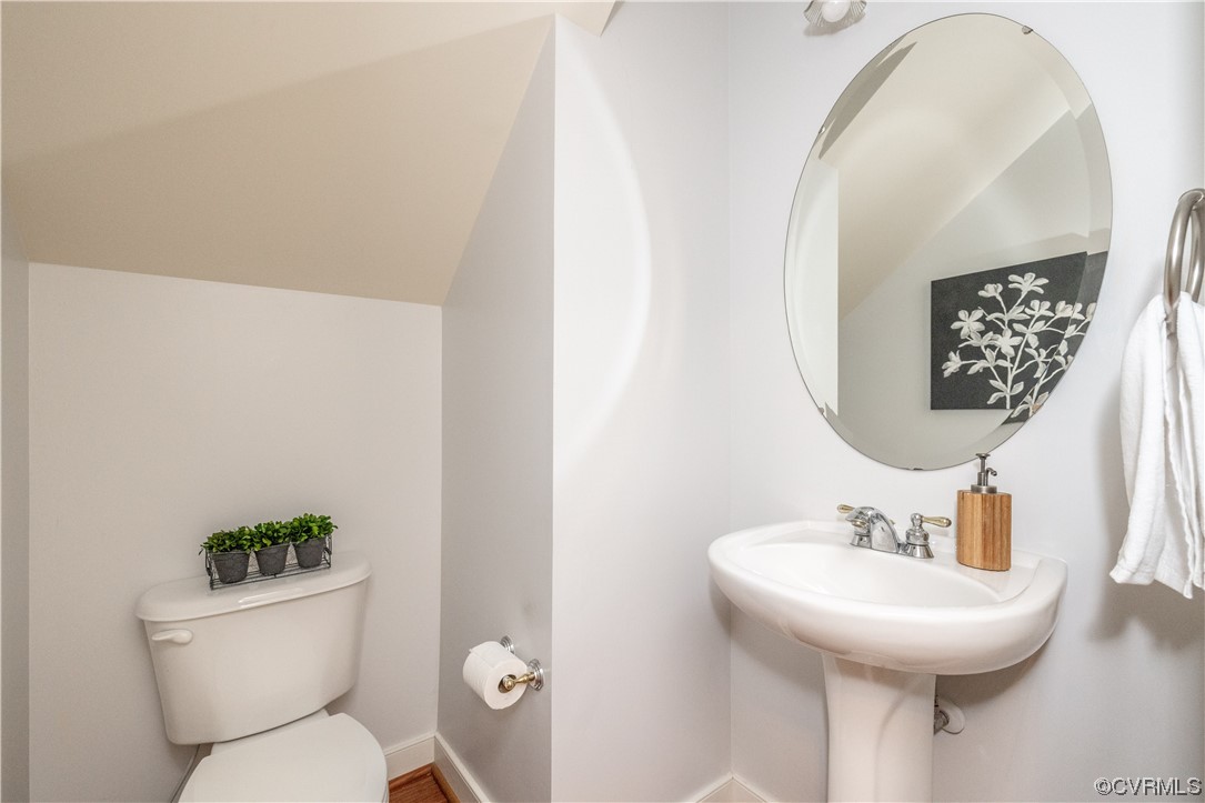 2152 Magnolia Grove Way, Unit 2152 Midlothian, VA 23113 - Photo 17 of 38 a bathroom with a toilet sink and mirror