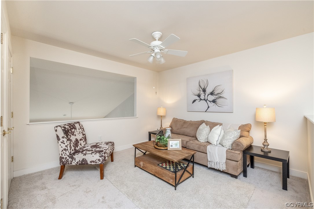 2152 Magnolia Grove Way, Unit 2152 Midlothian, VA 23113 - Photo 25 of 38 a living room with furniture and white walls