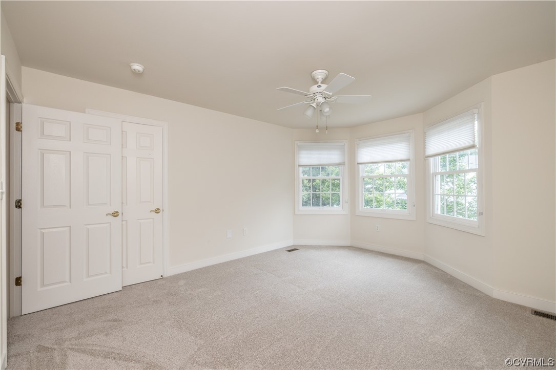 2152 Magnolia Grove Way, Unit 2152 Midlothian, VA 23113 - Photo 27 of 38 a view of an empty room with a window