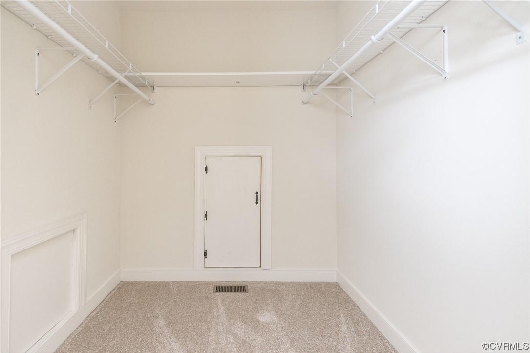 2152 Magnolia Grove Way, Unit 2152 Midlothian, VA 23113 - Photo 31 of 38 a view of an empty walk in closet