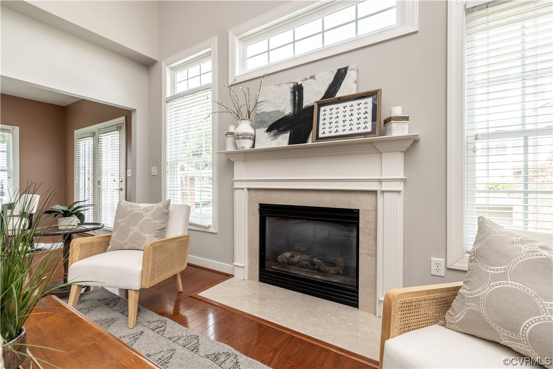 2152 Magnolia Grove Way, Unit 2152 Midlothian, VA 23113 - Photo 7 of 38 a living room with furniture a window and a fireplace