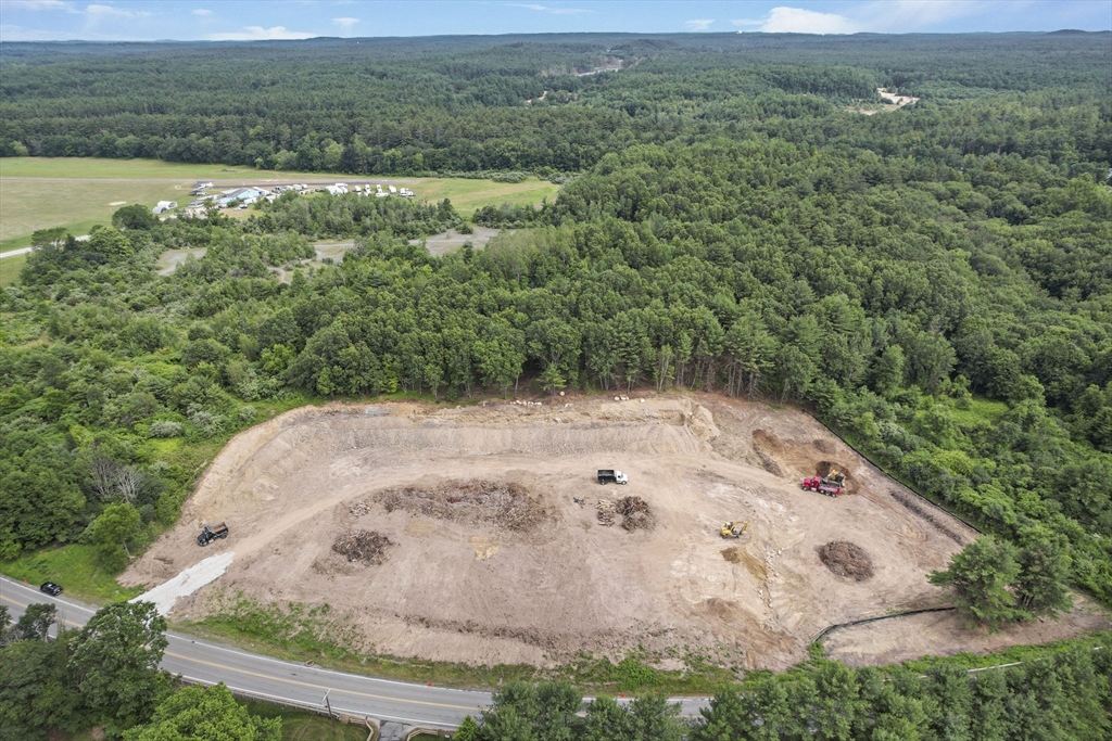 147 Nashua Road Pepperell, MA 01463 - Photo 8 of 11 a view of a field with an ocean view