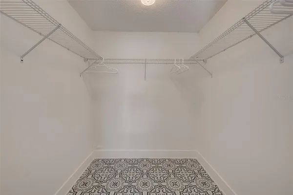 a view of a room with racks on the wall