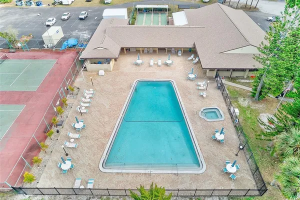 a view of an outdoor space pool patio and ocean view