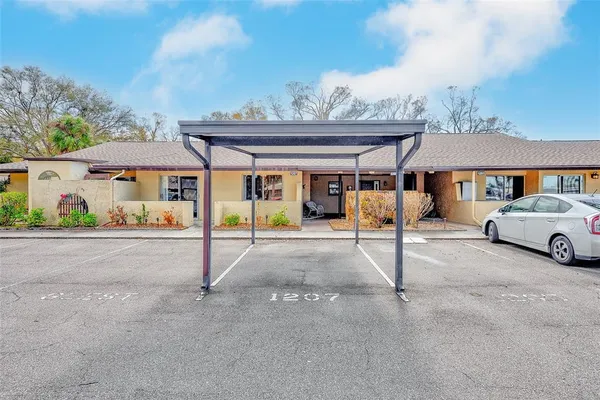 a view of a back yard of the house