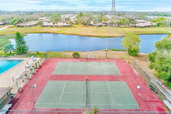 an aerial view of a house with a ocean view