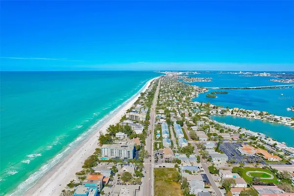 a view of swimming pool with seating space