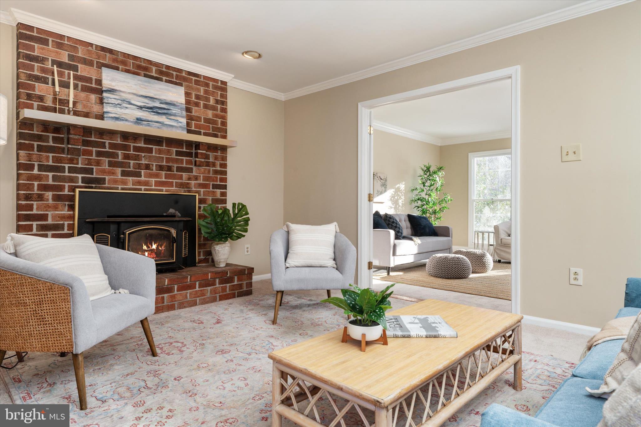 303 Pytchley Run Annapolis, MD 21403 - Photo 13 of 42 a living room with furniture a fireplace and a table