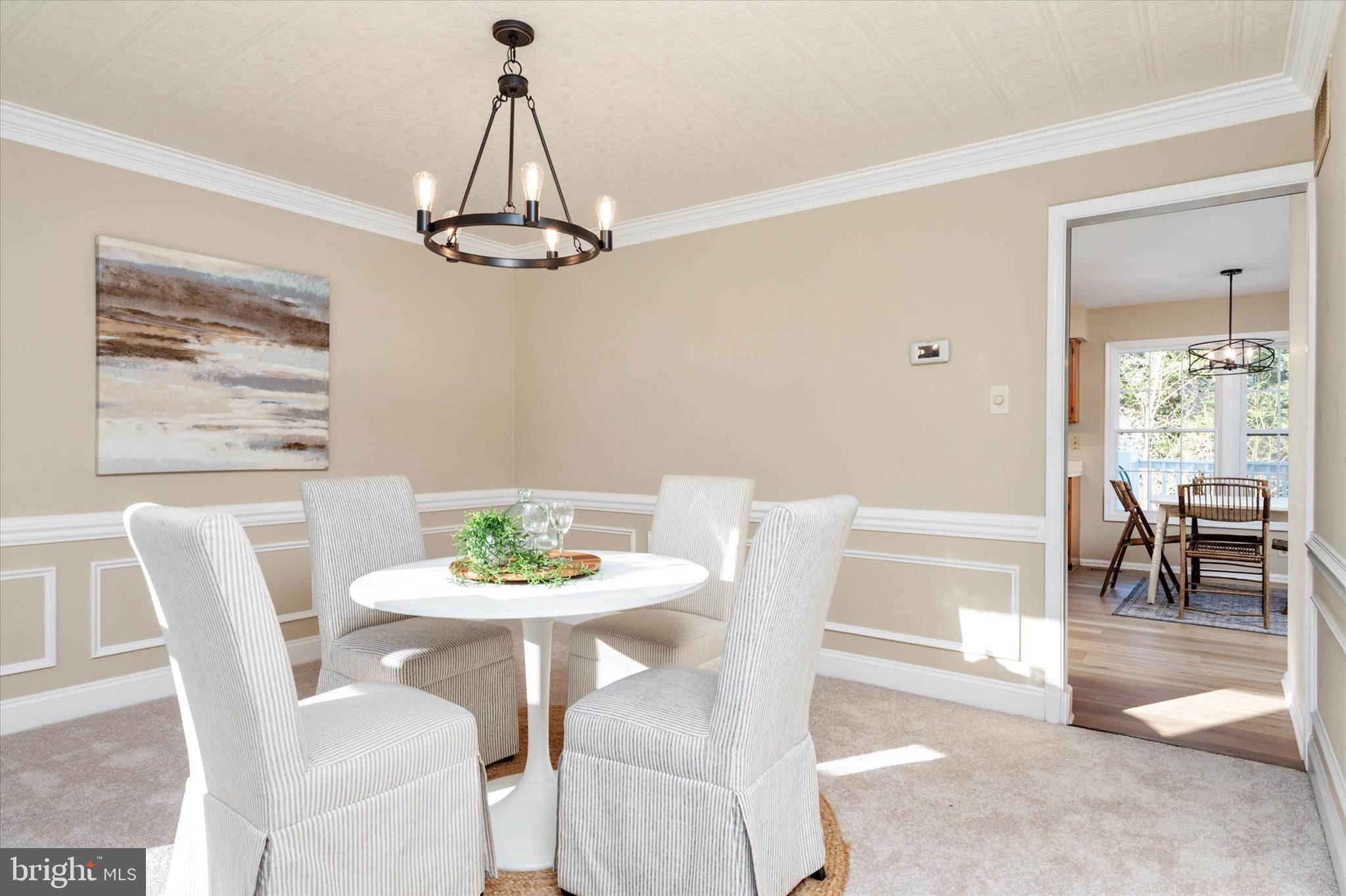 303 Pytchley Run Annapolis, MD 21403 - Photo 19 of 42 a view of a dining room with furniture window and outside view