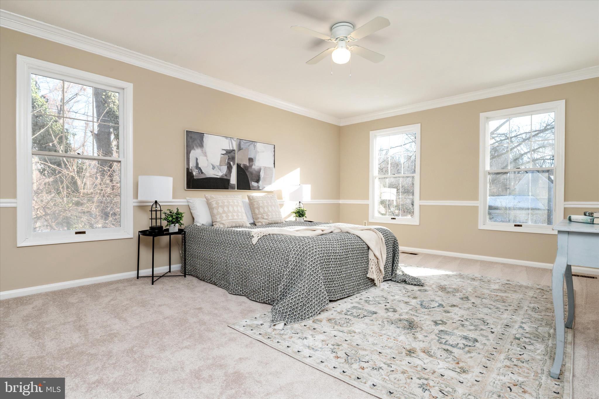 303 Pytchley Run Annapolis, MD 21403 - Photo 21 of 42 a bedroom with a large bed and a window