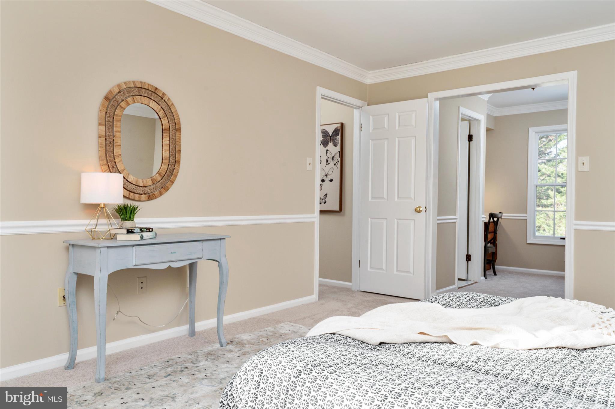 303 Pytchley Run Annapolis, MD 21403 - Photo 23 of 42 a bedroom with a bed and a mirror