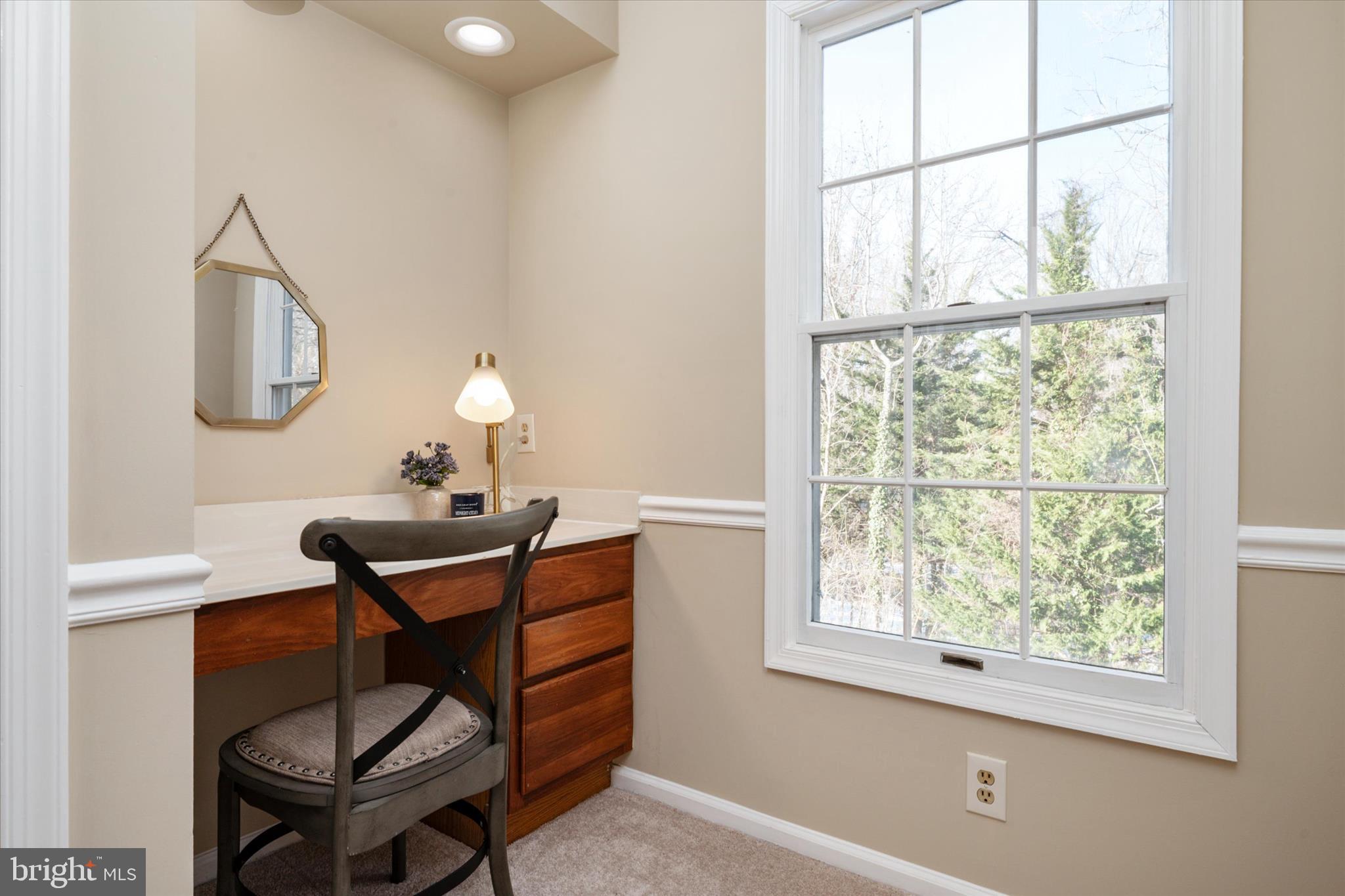 303 Pytchley Run Annapolis, MD 21403 - Photo 24 of 42 a view of a workspace with furniture and a window