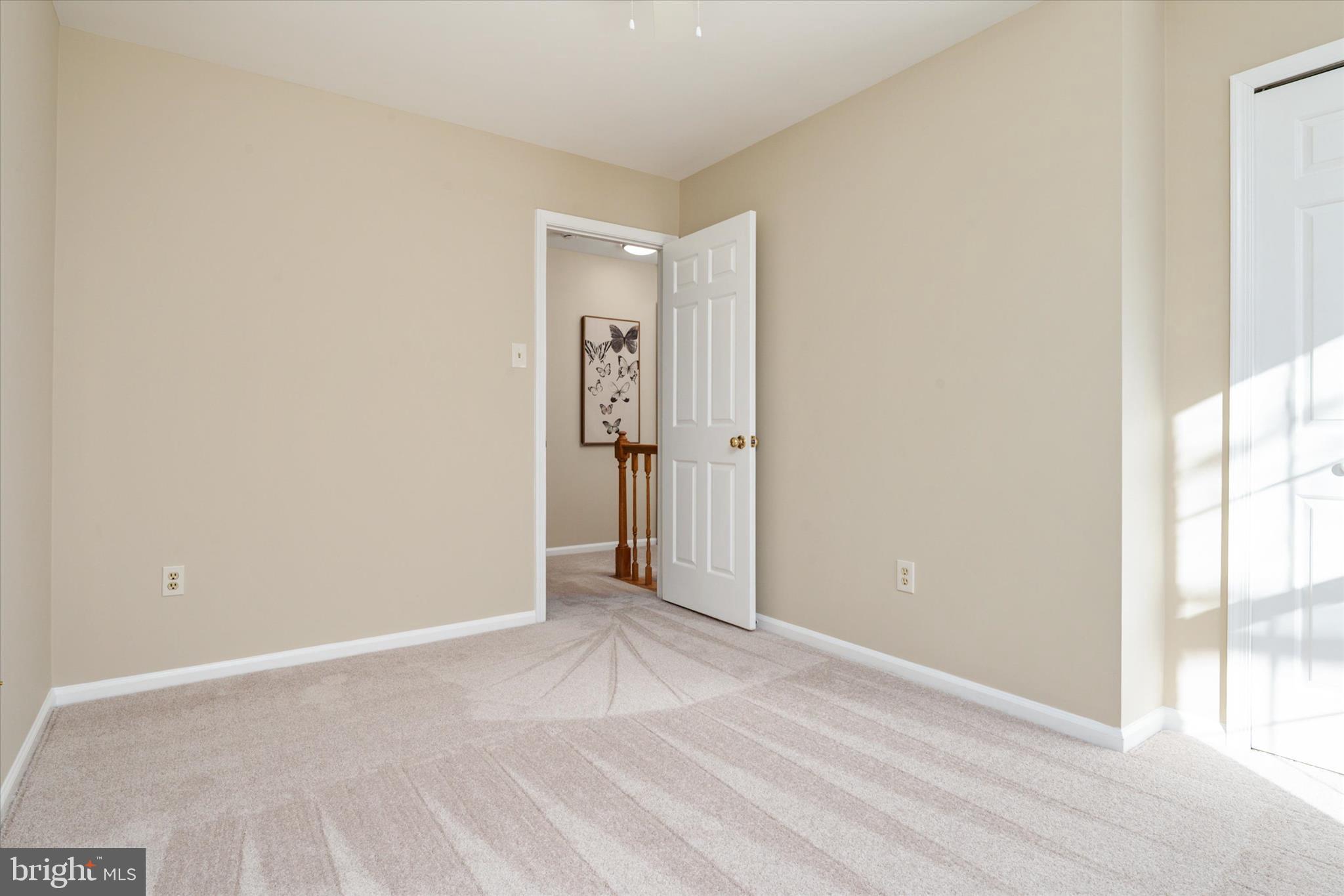 303 Pytchley Run Annapolis, MD 21403 - Photo 28 of 42 a view of a room with an empty space and a window