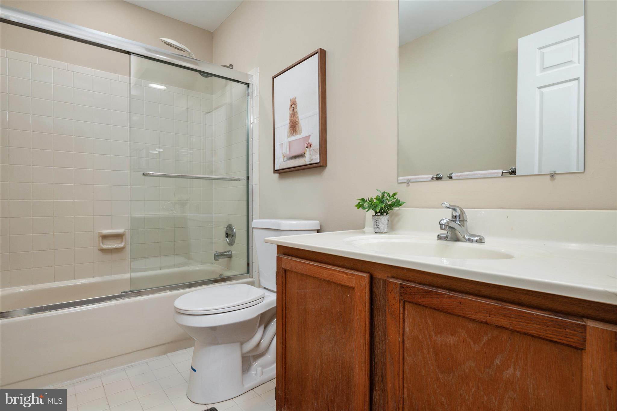 303 Pytchley Run Annapolis, MD 21403 - Photo 29 of 42 a bathroom with a sink a toilet and shower