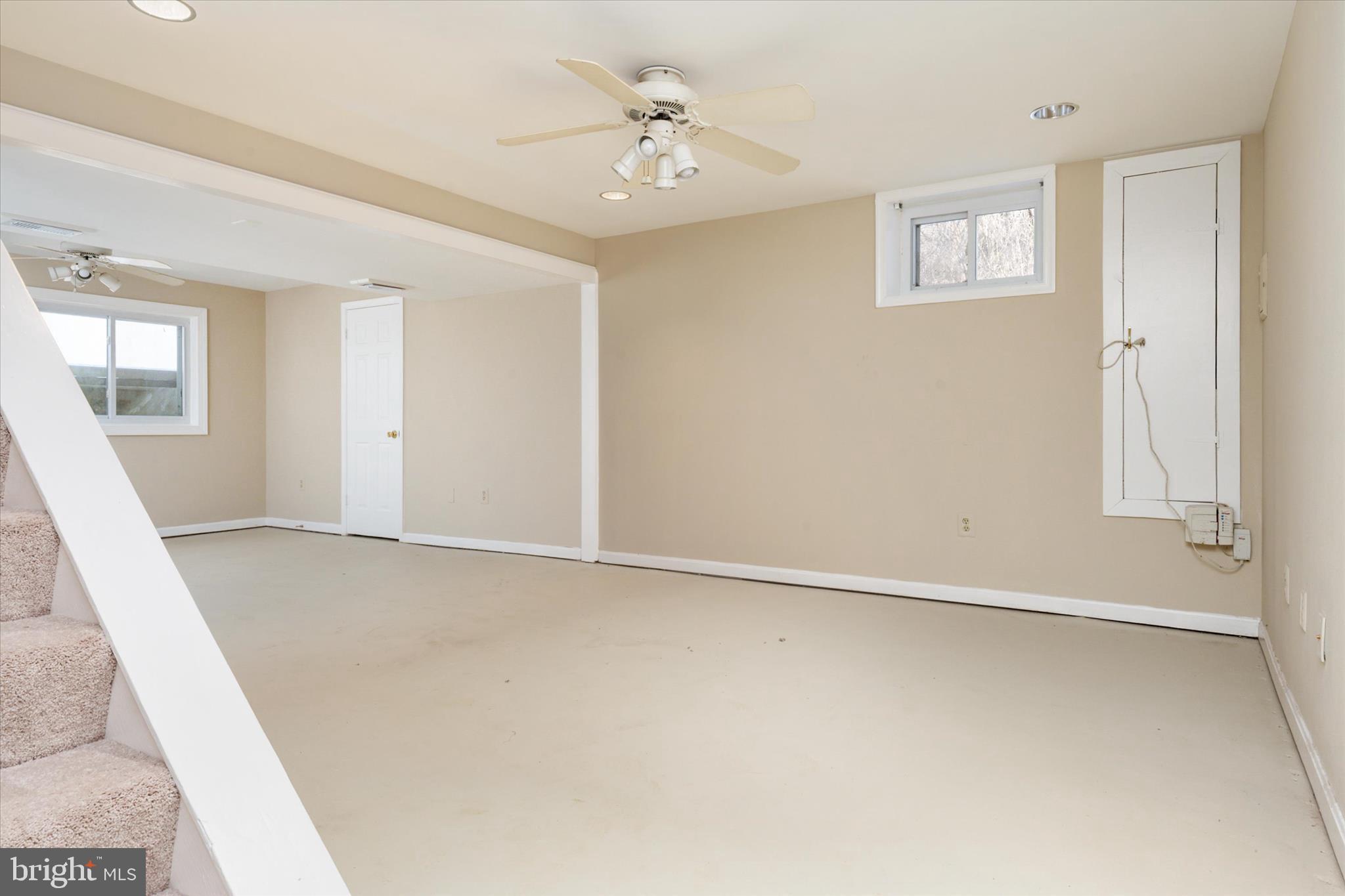 303 Pytchley Run Annapolis, MD 21403 - Photo 34 of 42 an empty room with windows and fan