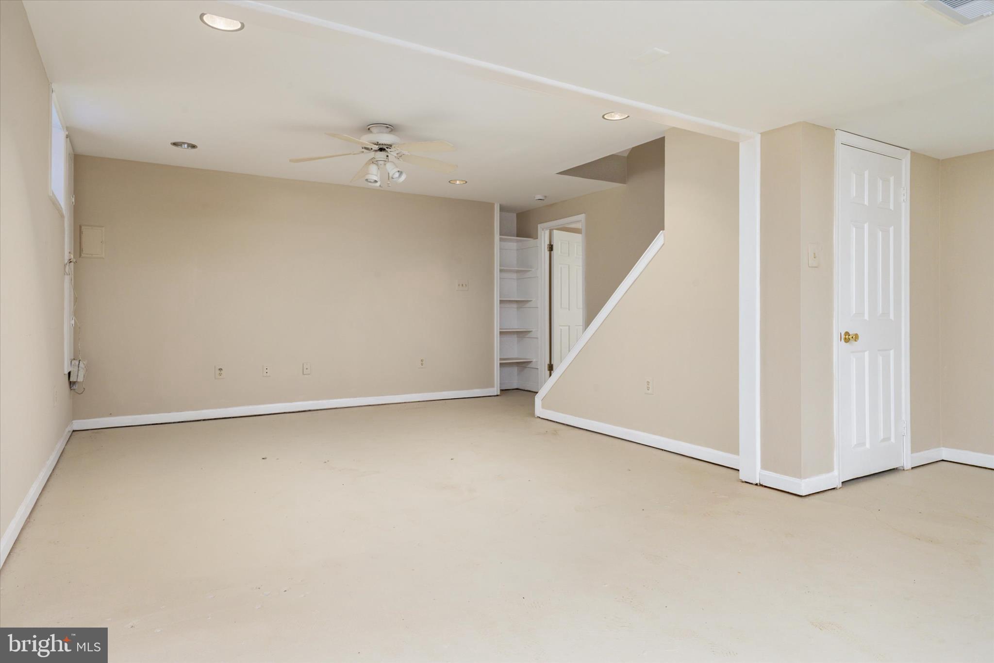 303 Pytchley Run Annapolis, MD 21403 - Photo 35 of 42 an empty room with a ceiling fan and entryway