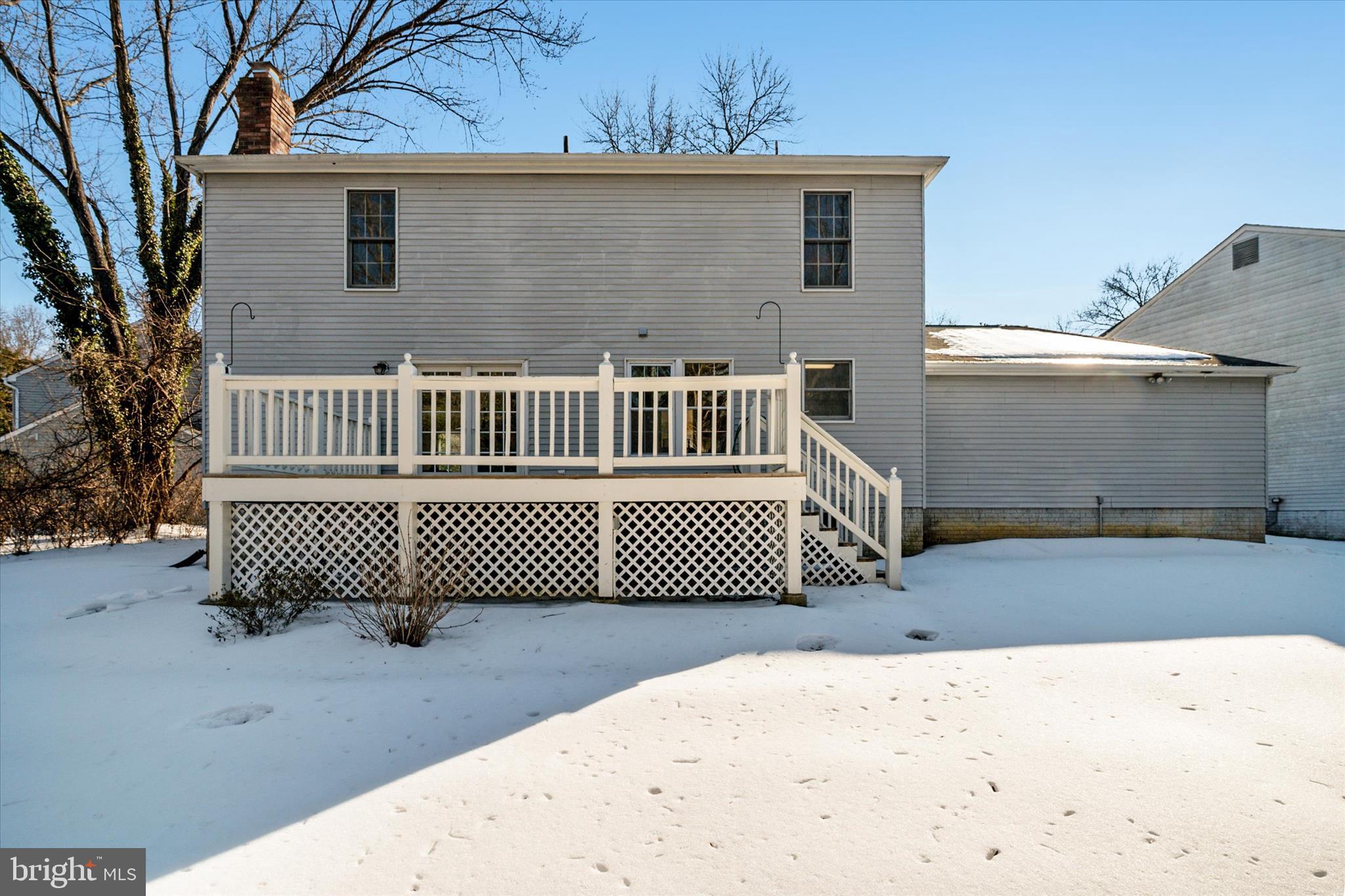 303 Pytchley Run Annapolis, MD 21403 - Photo 39 of 42 a view of a brick house with wooden fence