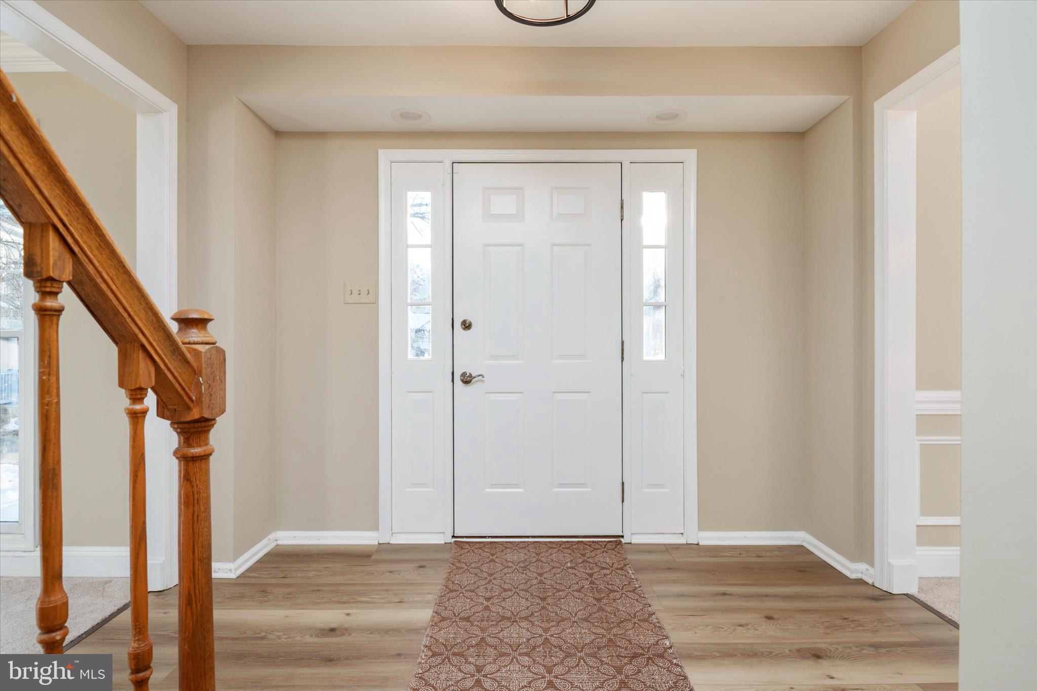 303 Pytchley Run Annapolis, MD 21403 - Photo 4 of 42 a view of an entryway with wooden floor