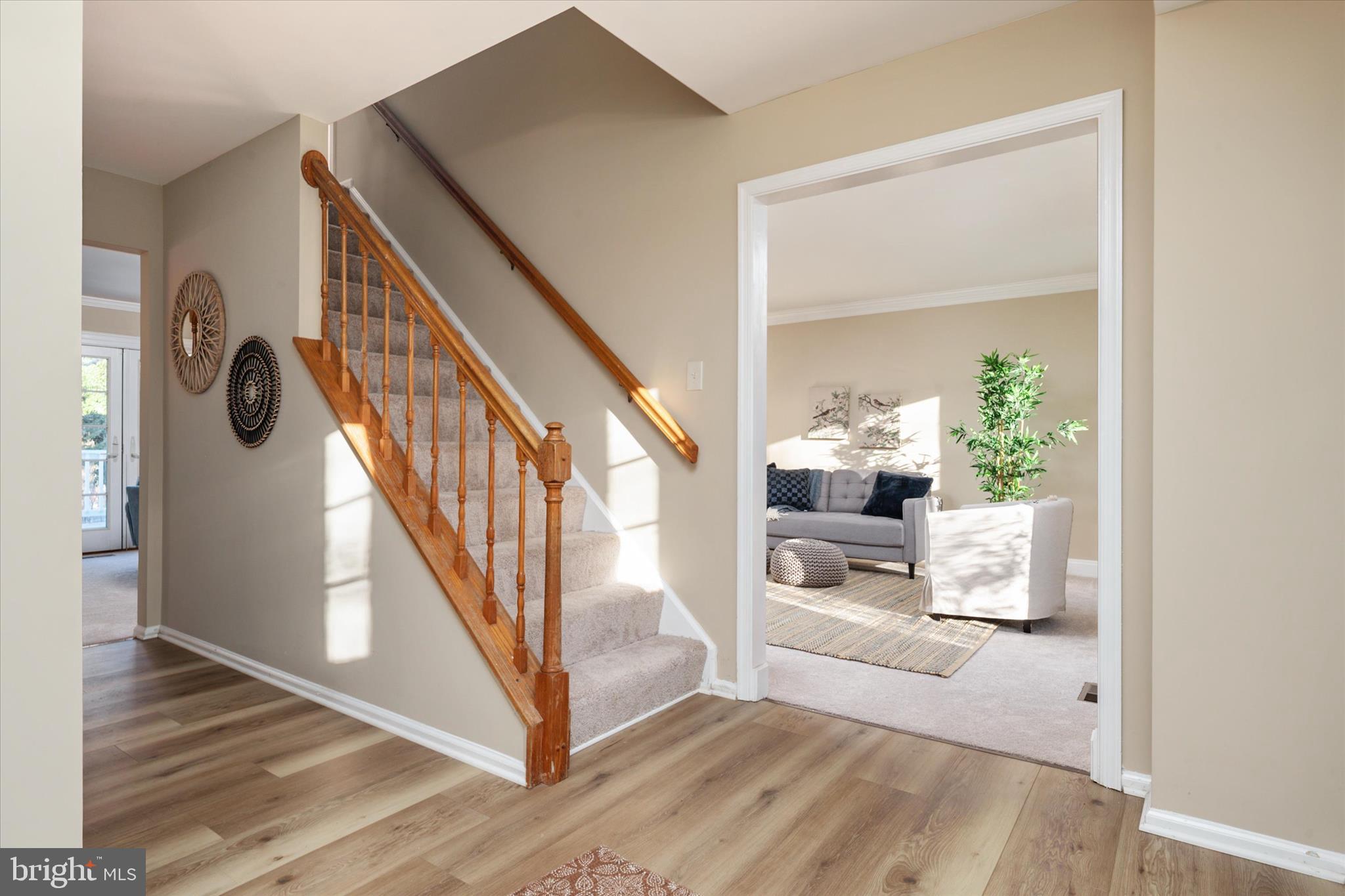 303 Pytchley Run Annapolis, MD 21403 - Photo 5 of 42 a view of entryway and hall with wooden floor