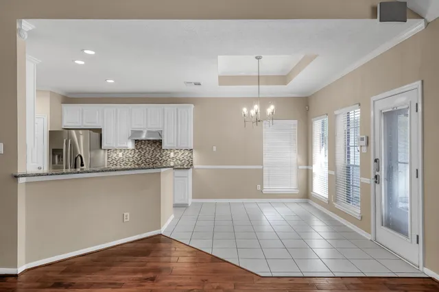 a bathroom with a sink a mirror and shower