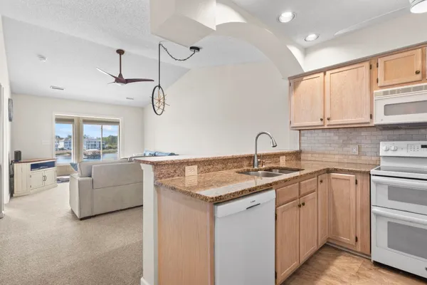 $219,900 | 4622 Greenbriar Drive, Unit G13, Little River, SC 29566