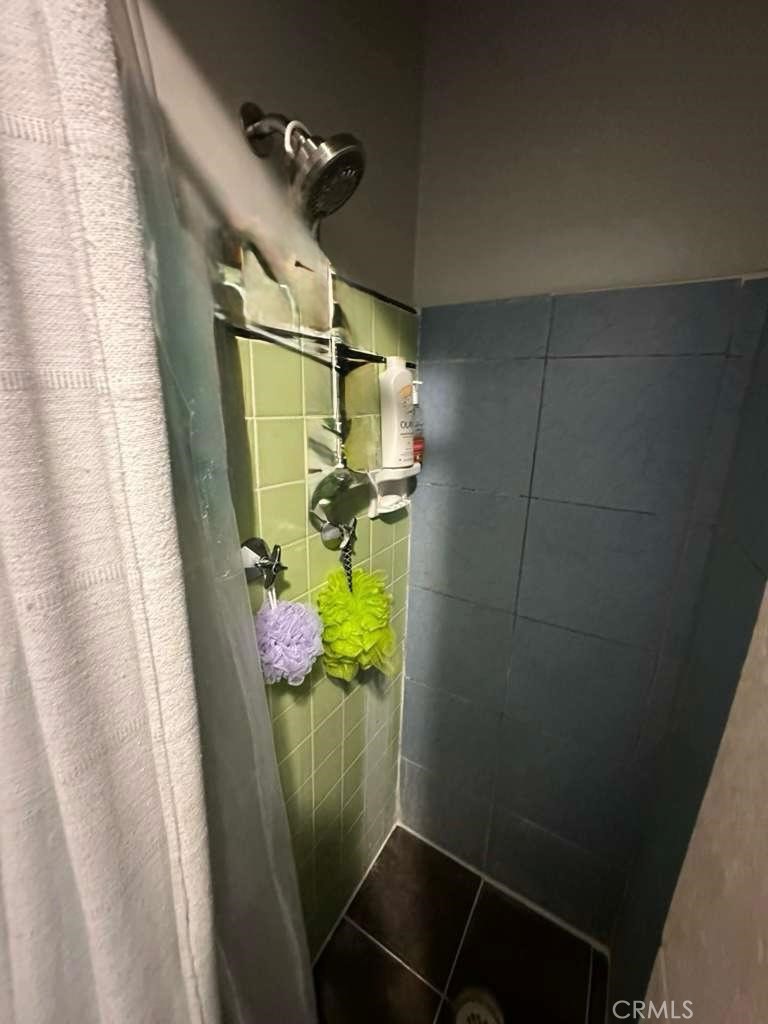 10401 State Street South Gate, CA 90280 - Photo 15 of 21 a bathroom with a sink and toilet