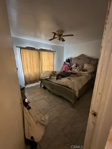 a bathroom with a glass door shower and a sink