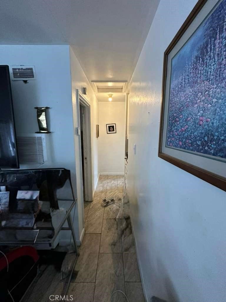 10401 State Street South Gate, CA 90280 - Photo 20 of 21 a bathroom with a glass door shower and a sink