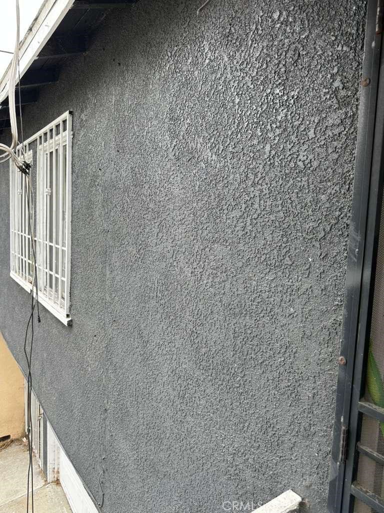 10401 State Street South Gate, CA 90280 - Photo 8 of 21 a bathroom with a shower curtain