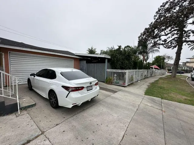 a view of a hallway with a workspace