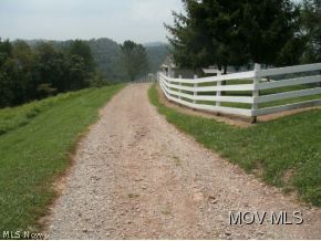 63 American Ridge Road New Martinsville, WV 26155 - Photo 17 of 24 Nice flowing road through..