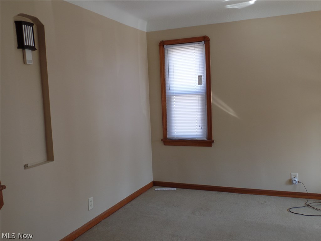 1818 Keystone Road Cleveland, OH 44134 - Photo 11 of 35 Living room is freshly painted and carpets have been cleaned!