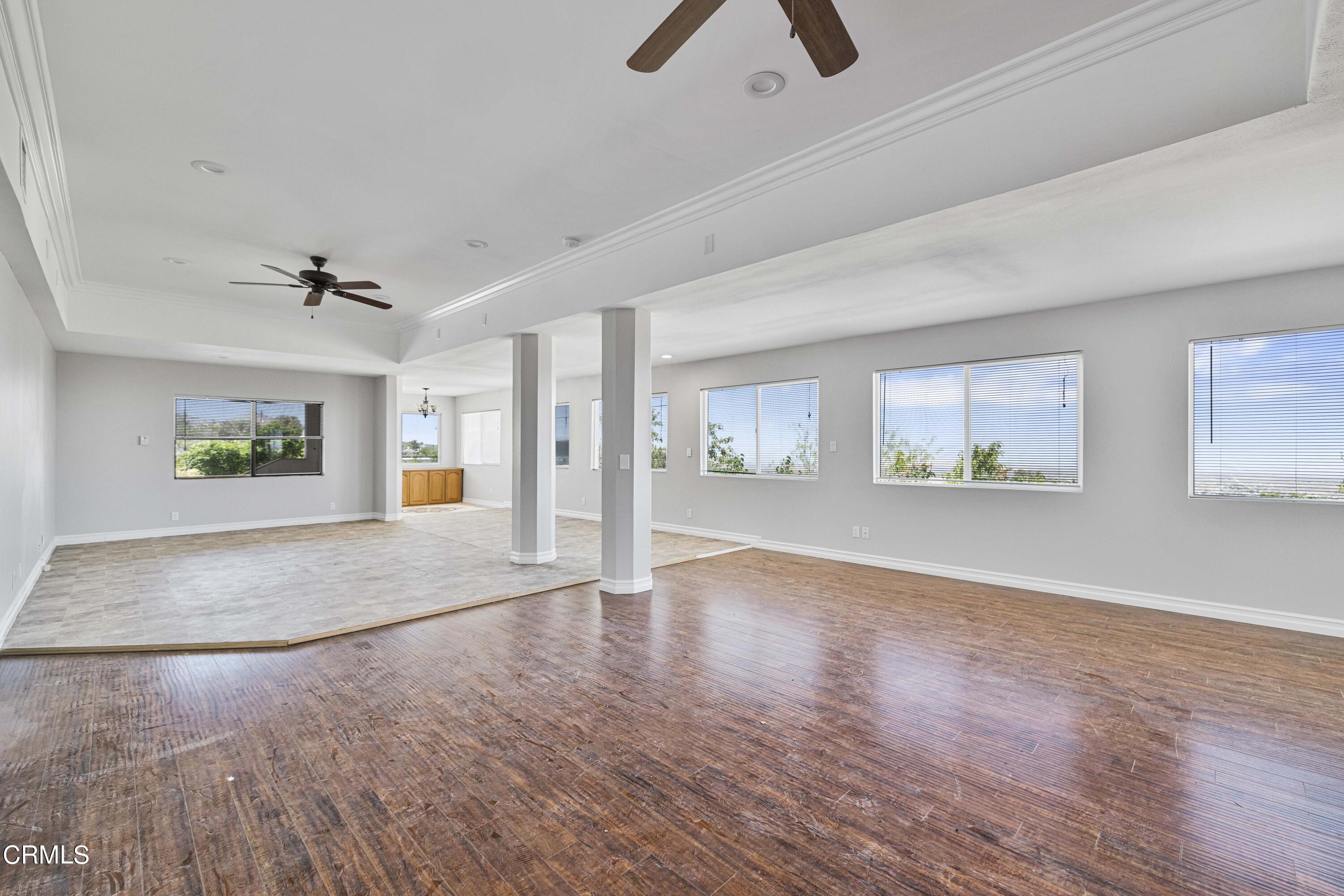 728 Nielson Road Pinon Hills, CA 92372 - Photo 8 of 50 wooden floor in an empty room with a window