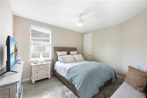 a bathroom with a shower and a sink
