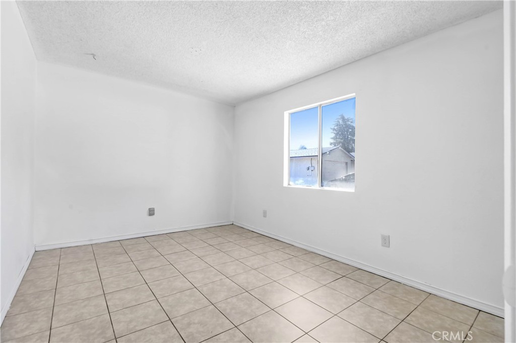 4039 Lorraine Drive, Unit 5 San Bernardino, CA 92407 - Photo 11 of 15 a view of an empty room