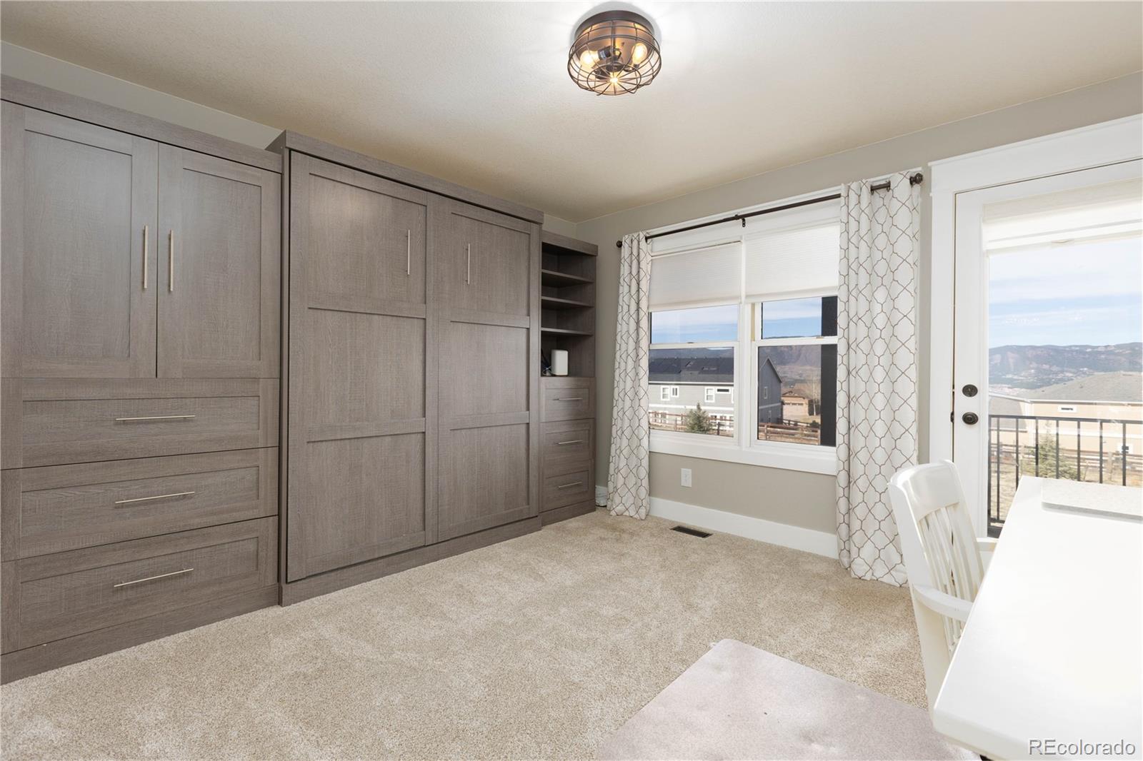 17840 New London Road Monument, CO 80132 - Photo 16 of 47 a view of an empty room with a window