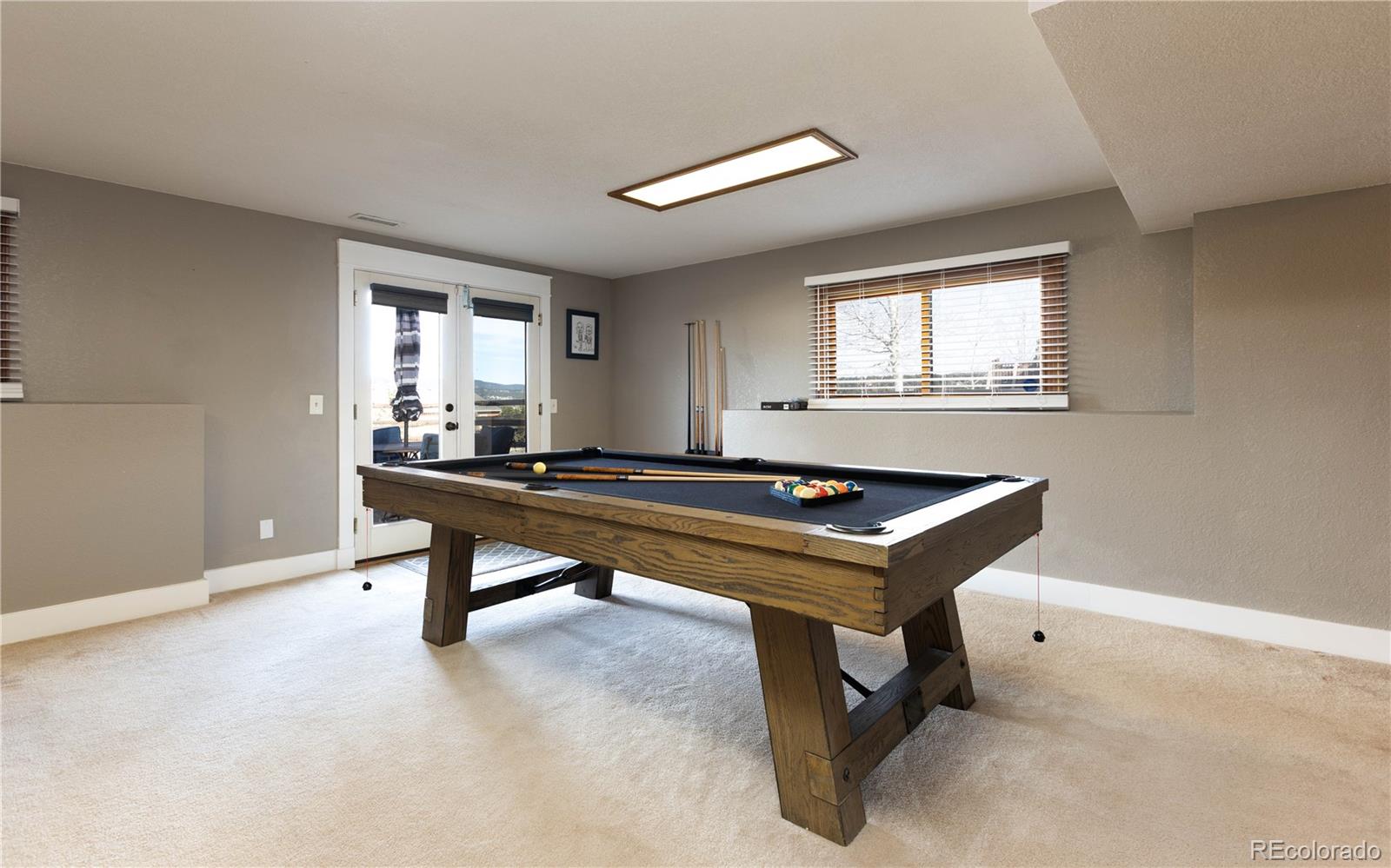 17840 New London Road Monument, CO 80132 - Photo 31 of 47 a room with pool table table and a window