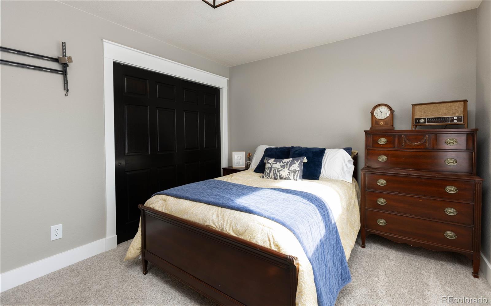 17840 New London Road Monument, CO 80132 - Photo 41 of 47 a bedroom with a bed and a closet