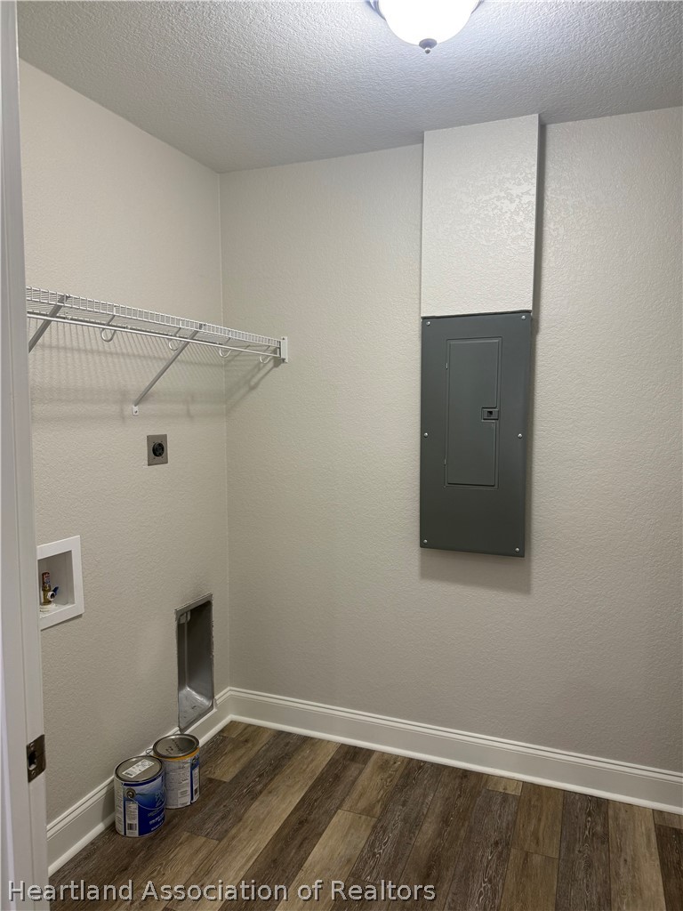 809 Redding Street Zolfo Springs, FL 33890 - Photo 7 of 8 a view of small space with empty racks on the wall