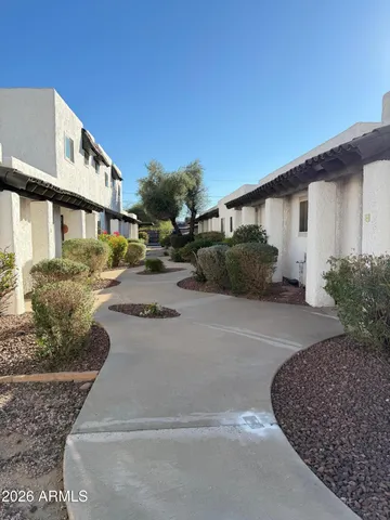 a view of a street with cars