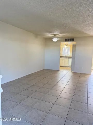 a view of an empty room and window