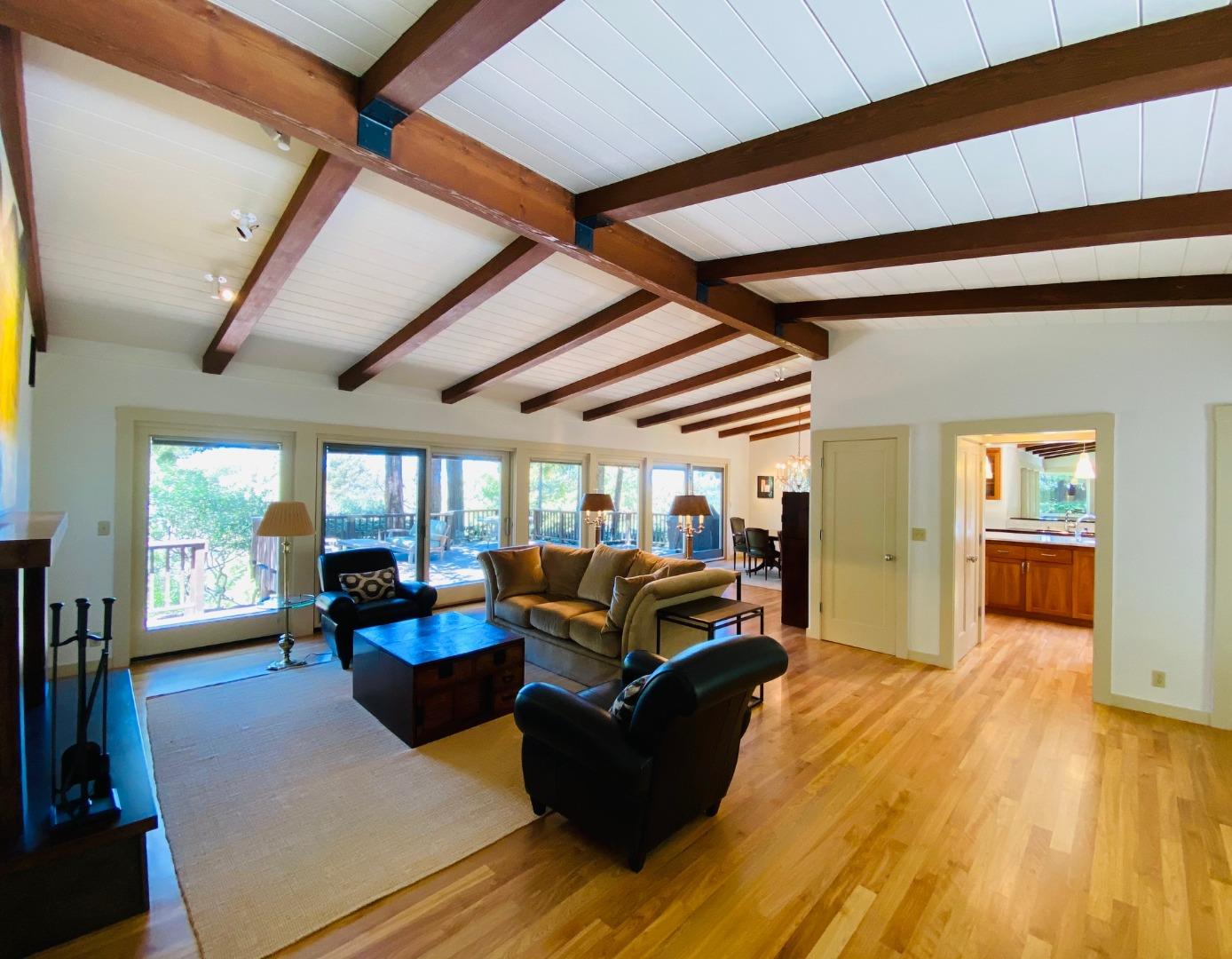 790 Patrol Road Woodside, CA 94062 - Photo 6 of 26 a living room with furniture and a wooden floor