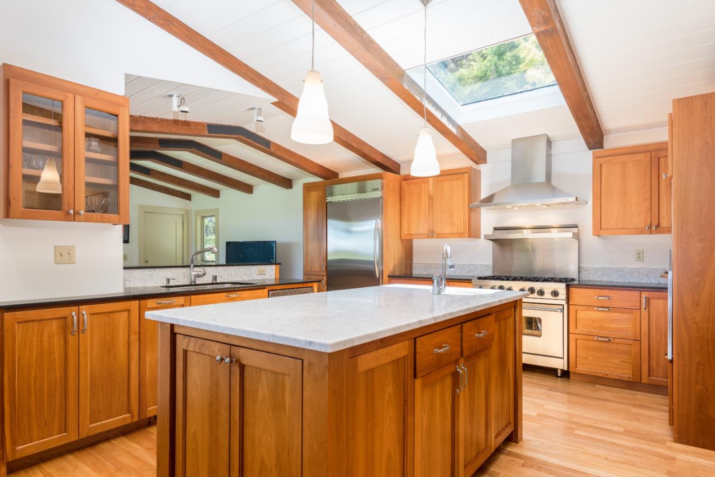 790 Patrol Road Woodside, CA 94062 - Photo 9 of 26 a kitchen that has a sink and a stove in it