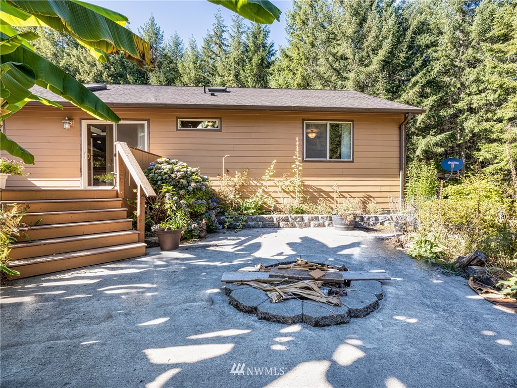 249 Coma Road Winlock, WA 98596 - Photo 28 of 38 an aerial view of a house with a yard and large trees