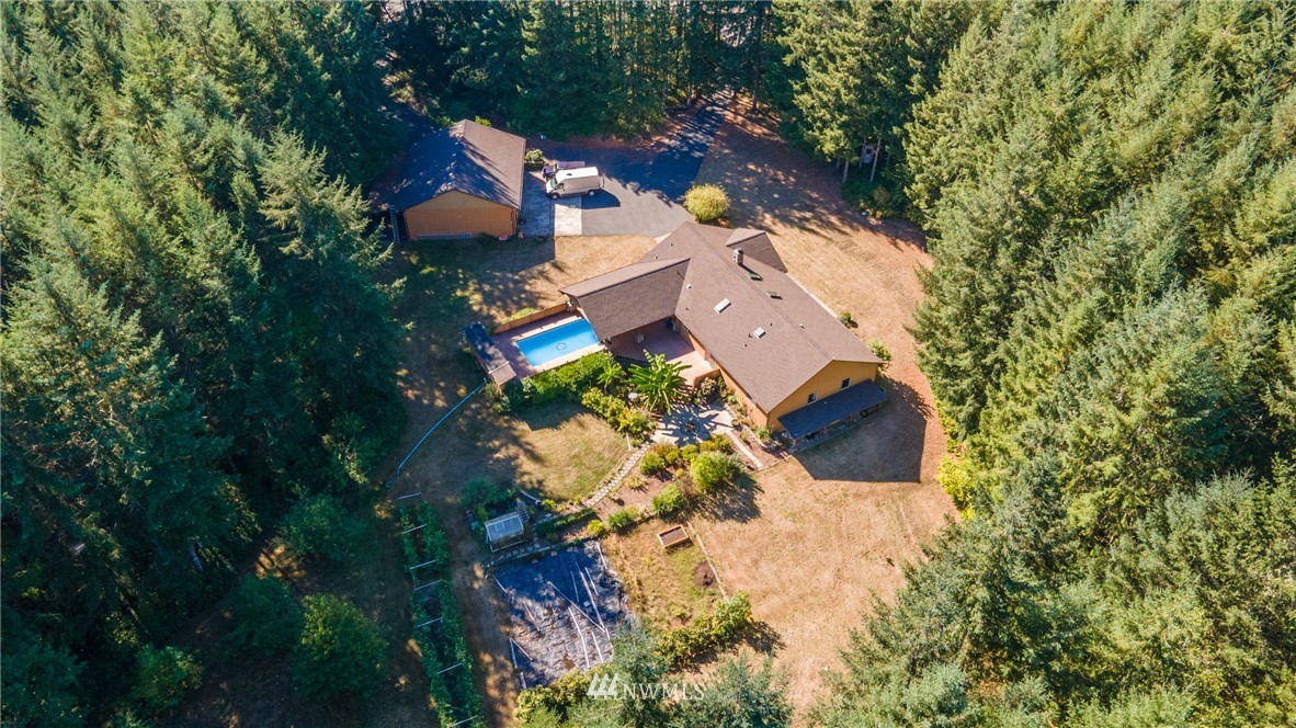 249 Coma Road Winlock, WA 98596 - Photo 31 of 38 an aerial view of a house with a yard and outdoor seating